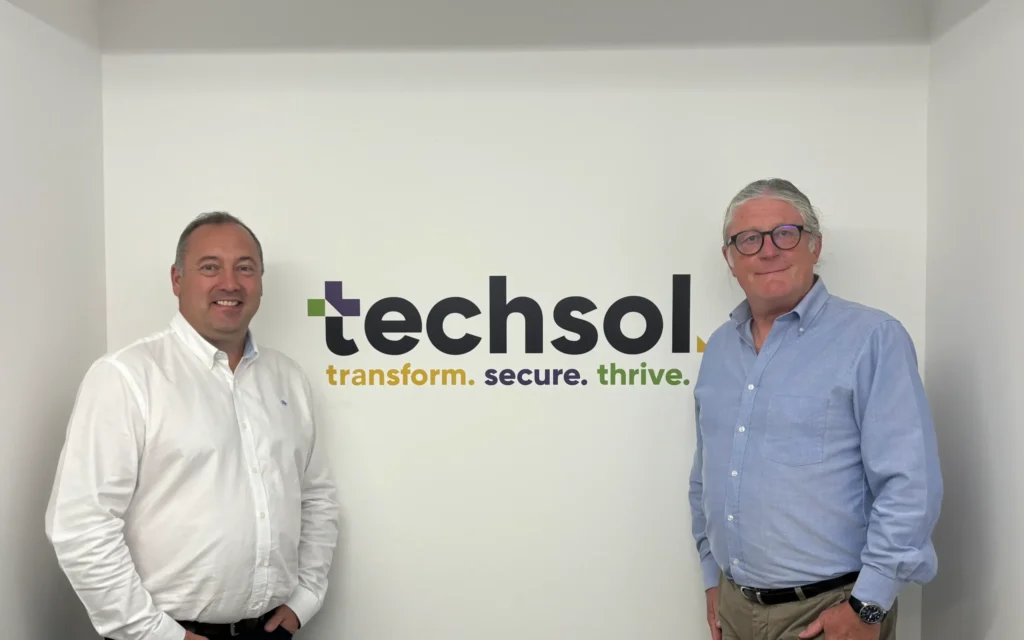 Techsol acquisition partners standing at the Cardiff office